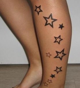Great black star tattoo on leg