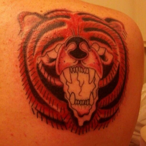 Great looking red bear tattoo on shoulder