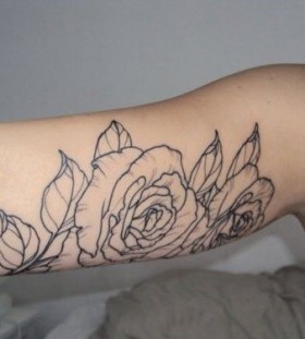 Great looking rose tattoo on arm