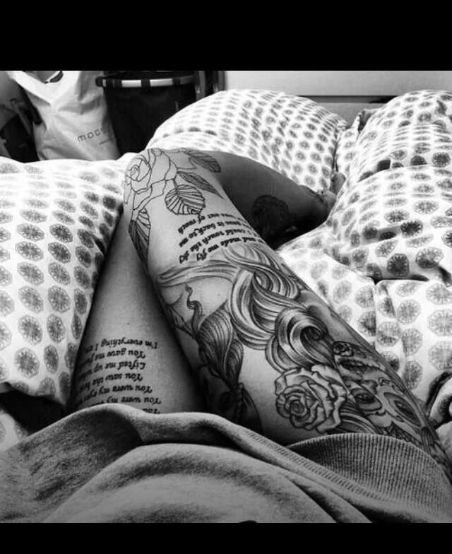 Great looking rose tattoo on leg