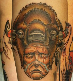 Great men's face tattoo on arm
