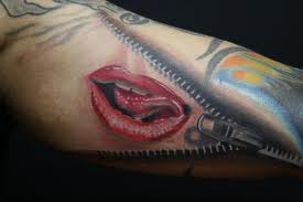 Great tongue and lips tattoo on arm