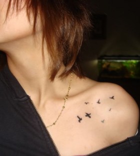 Great women bird tattoo on shoulder