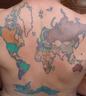 Green, black and yellow map tattoo on back