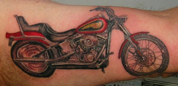 Groovy Harley Davidson bicycle tattoo on arm