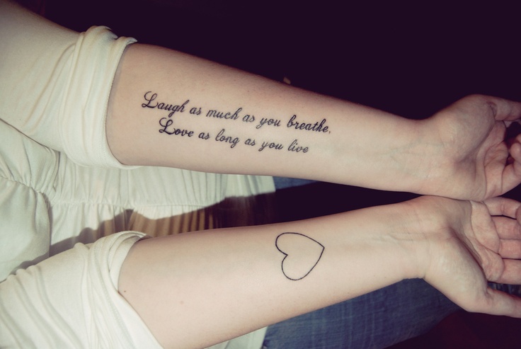 Hear, love and quote tattoo on arm
