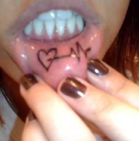 Heart puls lips tattoo