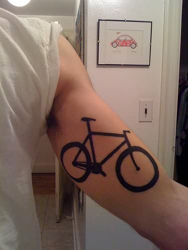 Huge big bicycle tattoo on arm