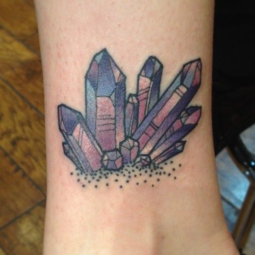 Huge blocks of crystal tattoo on leg