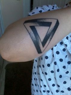 Illusion triangle tattoo
