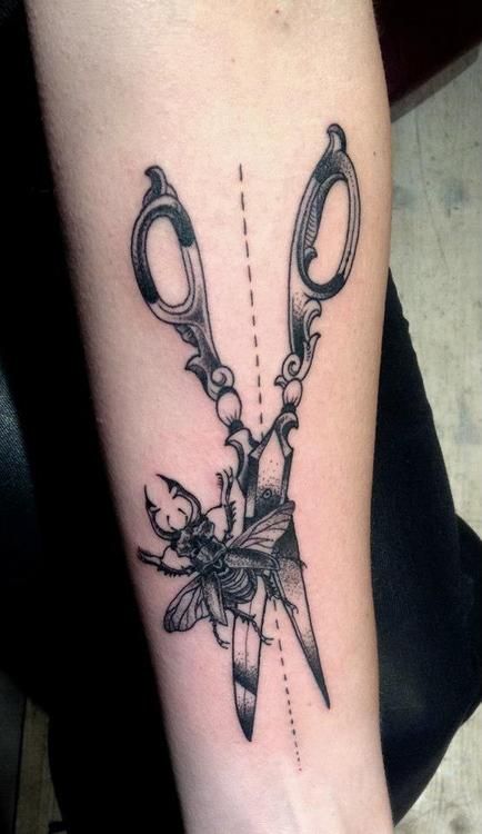 Insect, scissor and ornaments tattoo