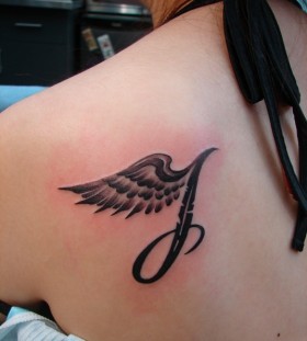 J letter tattoo on shoulder