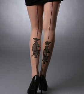 King and lovely line tattoo on leg