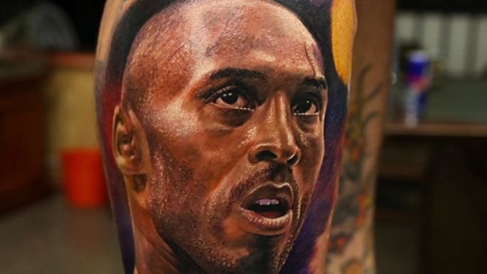 Kobe Bryant’s face tattoo on leg