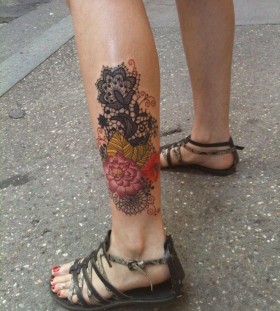 Lace and black owal interesting design tattoo
