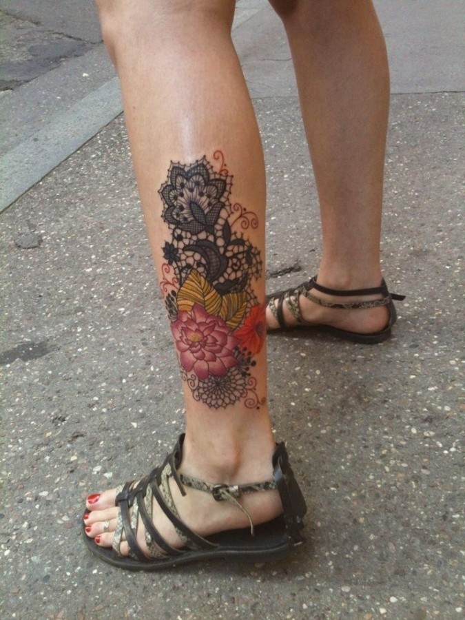 Lace and black owal interesting design tattoo