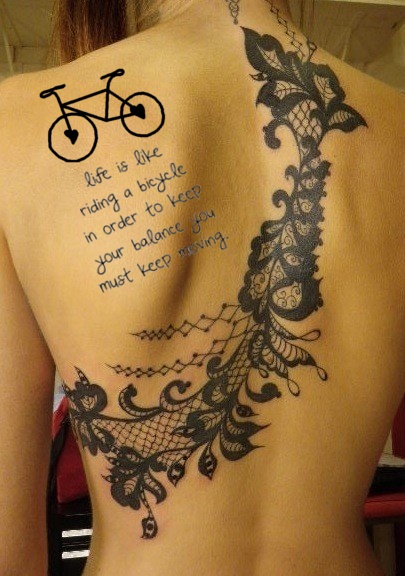 Lace and quotes bicycle tattoo on back