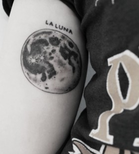 Laluna black moon tattoo on arm
