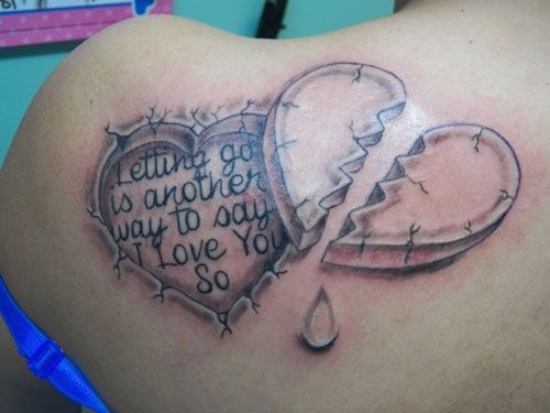 Letters and adorable heart tattoo
