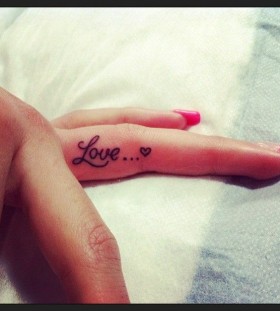 Love heart quote tattoo on finger