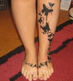 Lovely black butterfly tattoo on leg