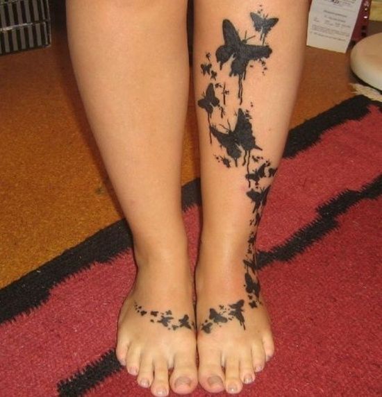 Lovely black butterfly tattoo on leg