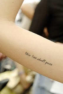 Lovely black quote tattoo on arm