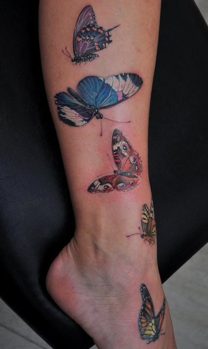 Lovely butterflies tattoo by Dimitry Samohin