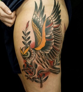 Lovely colorful bird tattoo on leg