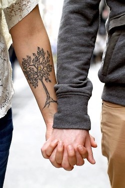 Lovely couple tree tattoo on arm