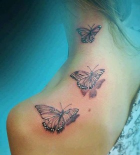 Lovely girl butterfly tattoo on shoulder