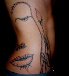 Lovely girl's face tattoo on arm