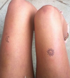 Lovely small moon and sun tattoo on leg