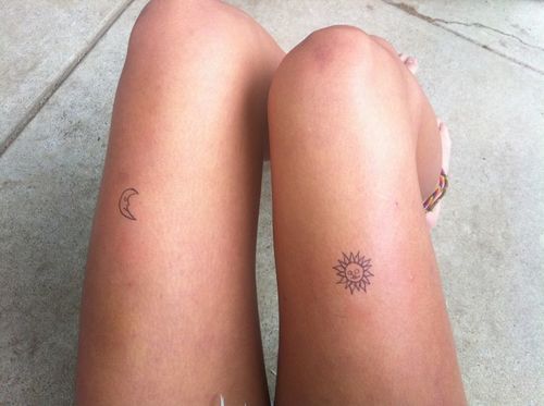 Lovely small moon and sun tattoo on leg
