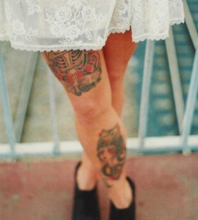 Lovely white dress and lace tattoo on leg