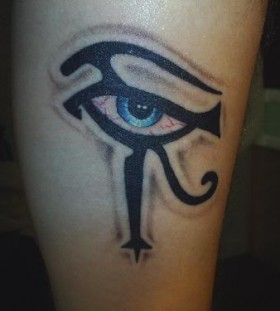 Marvelous blue eye tattoo on leg