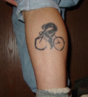 Men's simple bicycle tattoo on leg