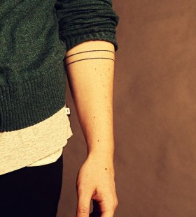 Minimal design line tattoo on arm