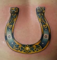 Miracles blue horse shoe tattoo