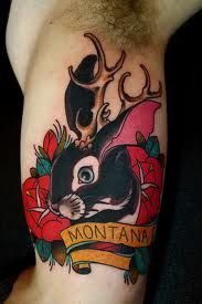 Montana black rabbit tattoo on body