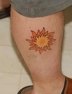 Orang owal sun tattoo on leg