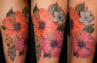 Orange and pink hawaiian style tattoo