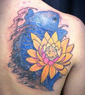Orange flower and blue fish tattoo on arm