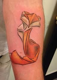 Orange fox and origami tattoo on leg