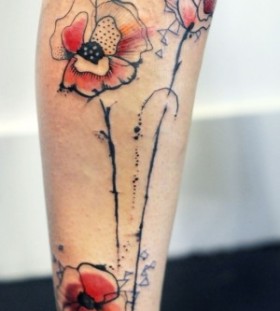 Pattern watercolor poppy tattoo on leg