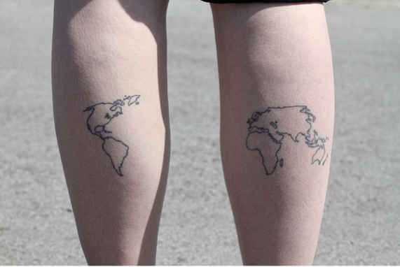 Perfect lovely map tattoo on legs