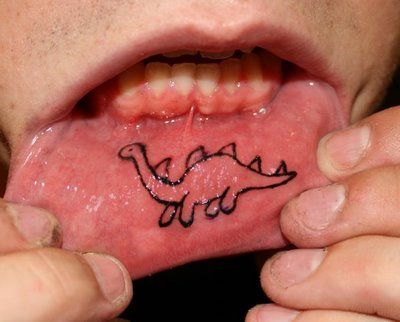 Physic style dino lips tattoo