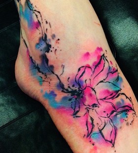 Pink flower watercolor tattoo