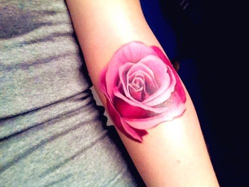 Pink lovely rose tattoo on arm