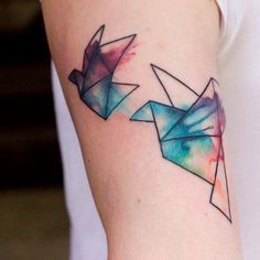 Pretty birds origami tattoo on arm